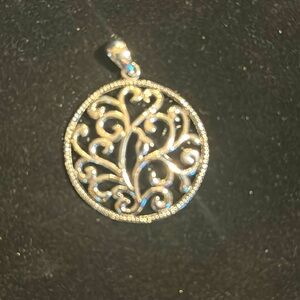 Silver disc pendant
